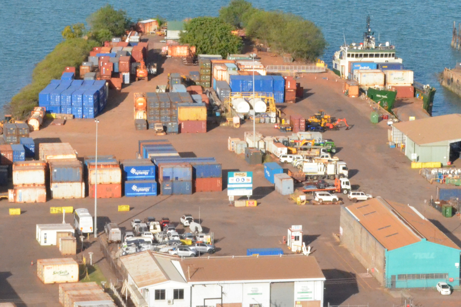 Shipping containers sitting on a dock in Darwin harbour.